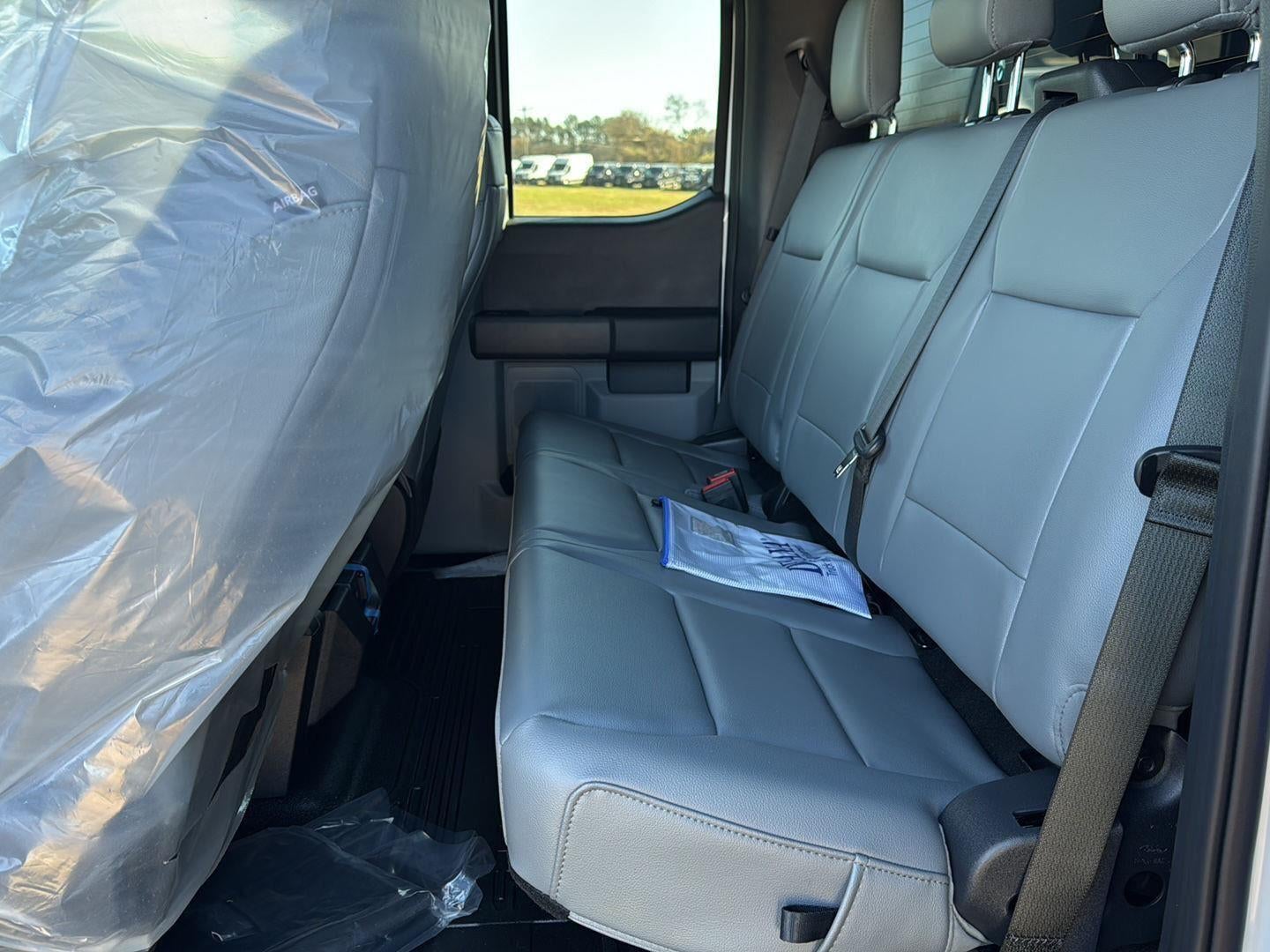 2024 Ford Super Duty F-450 DRW 12' RUGBY HEAVY DUTY STAKELESS LANDSCAPE BODY, 48" SOLID BARN DOORS, MANUAL TARP, 36" FULL CAB SHIELD, DROP DOWN COMBO HITCH 2 5/15